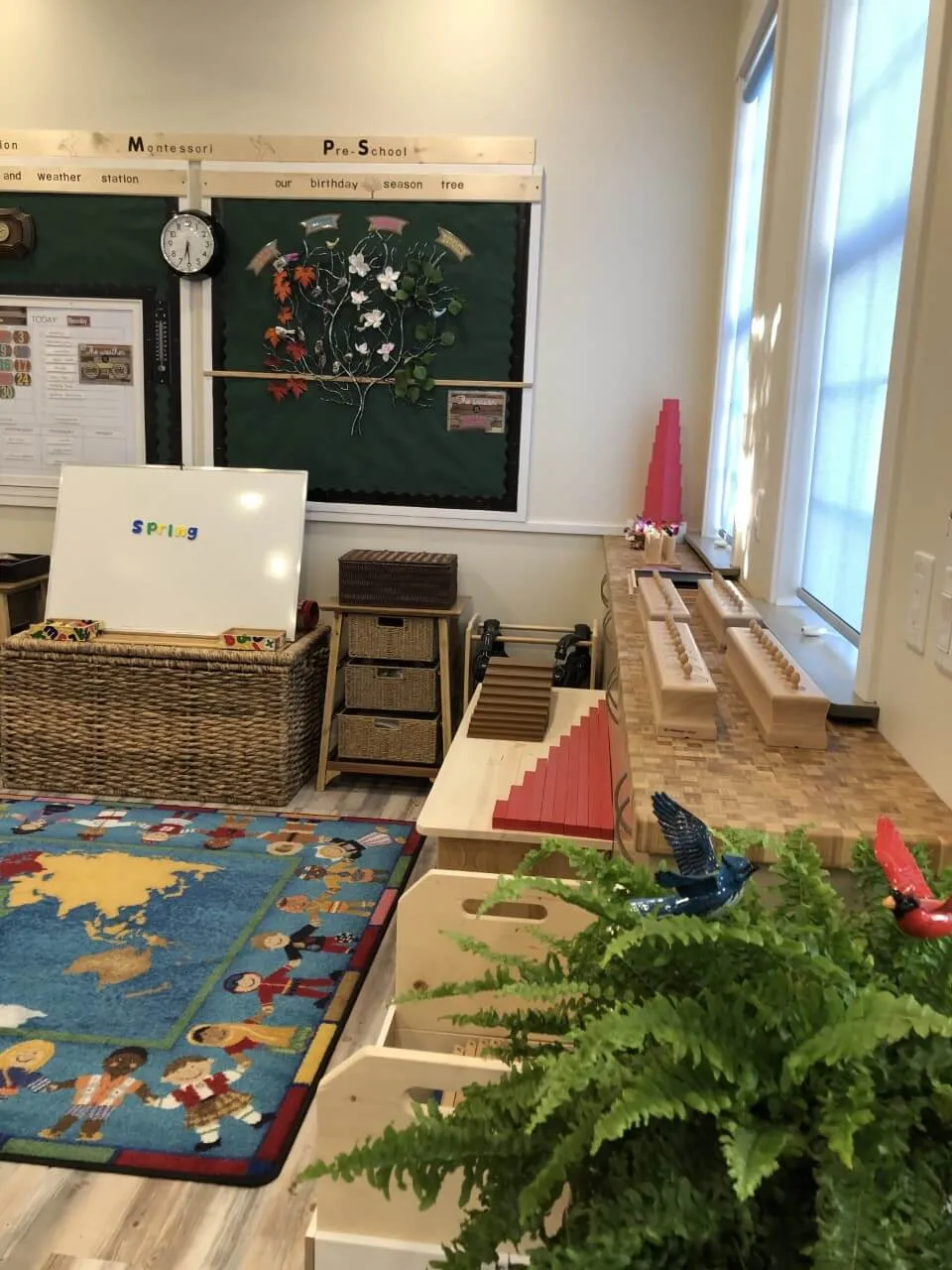 Child-height chalkboards on the classroom wall